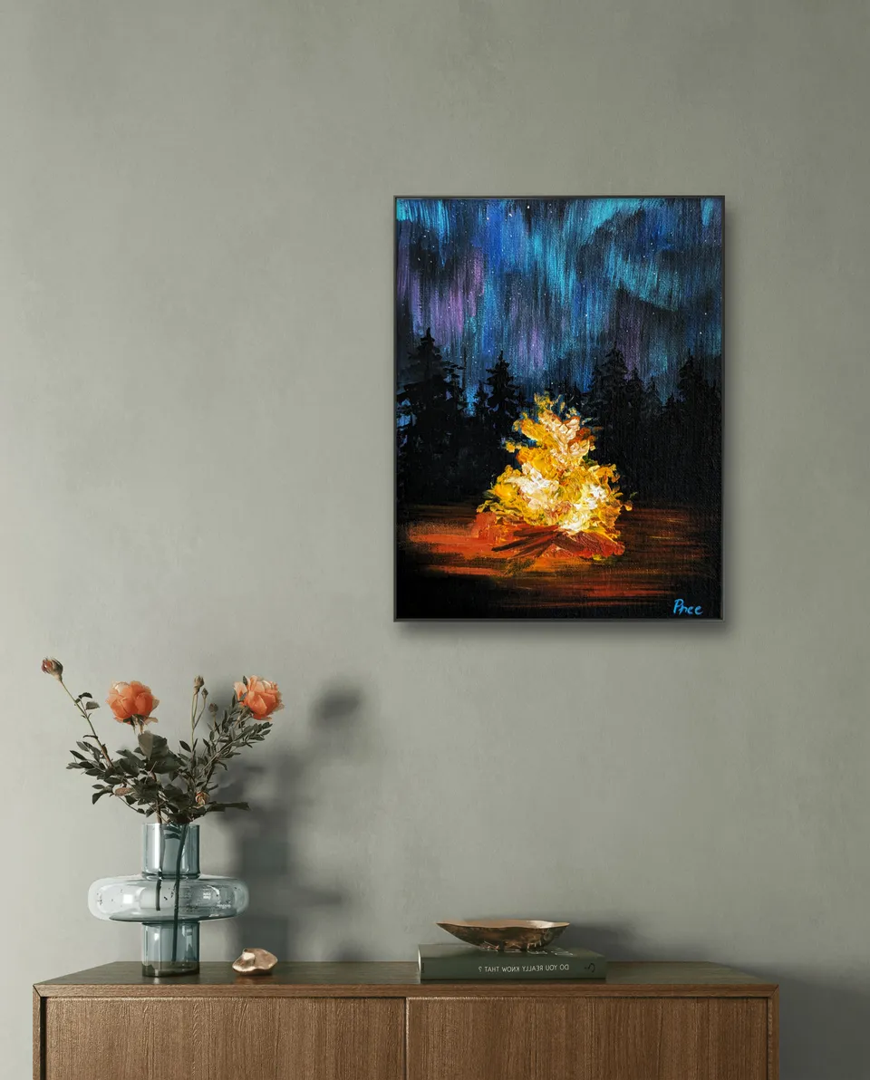 Campfire artwork displayed in a room